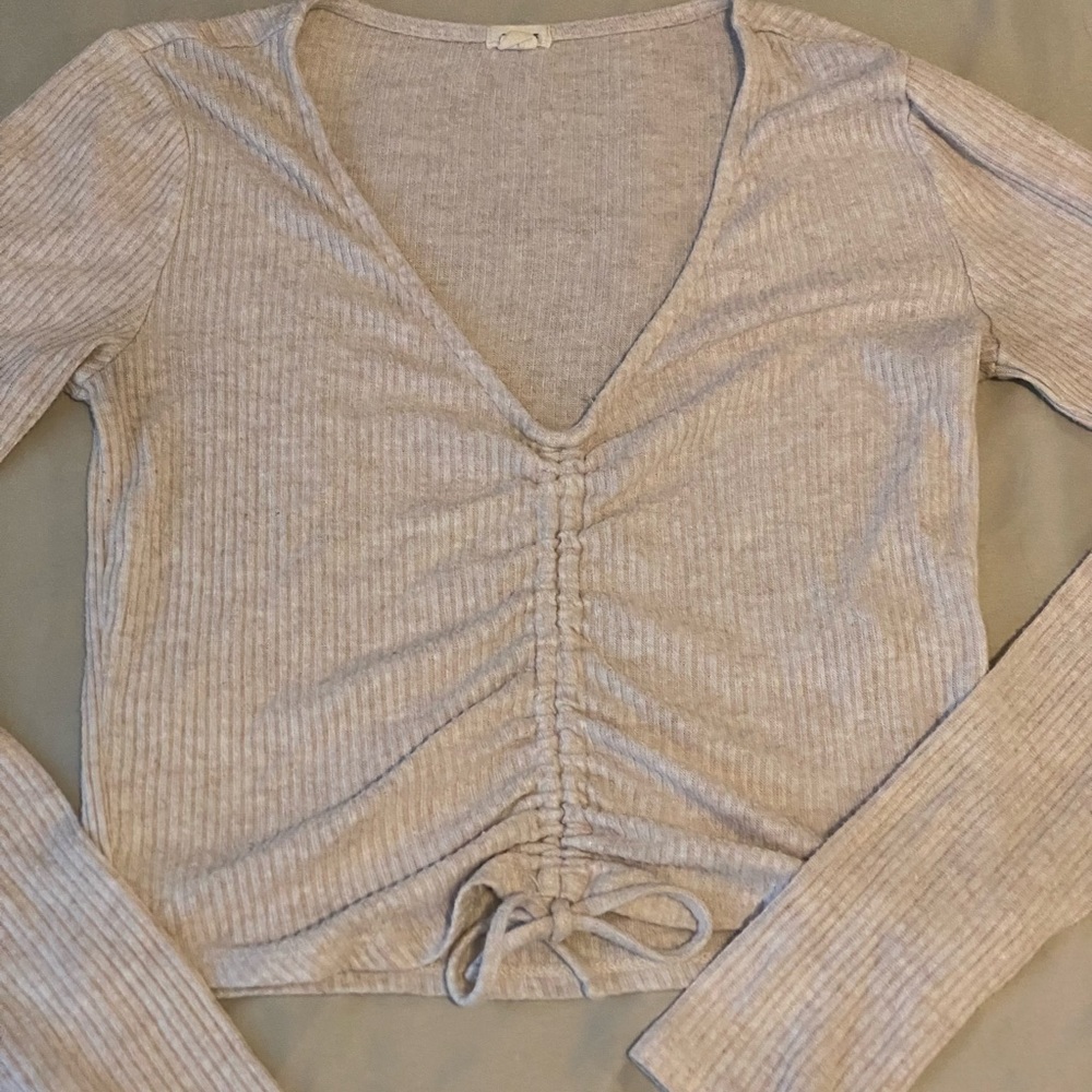 Cream adjustable top from Garage, size small, good condition